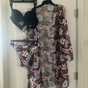 Designer 2 Piece Swimsuit and matching cover up.